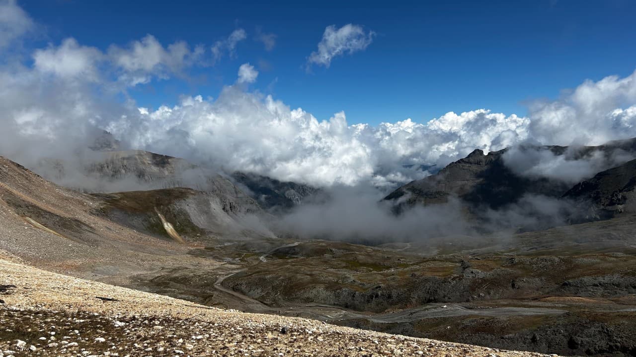 Clouds moving through a high alpine basin in the San Juan Mountains of Colorado